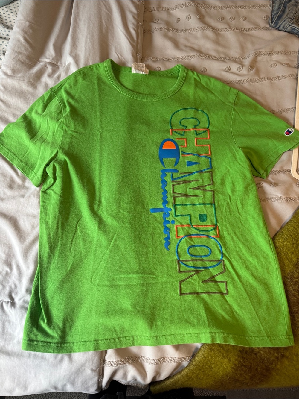 Champion Tee